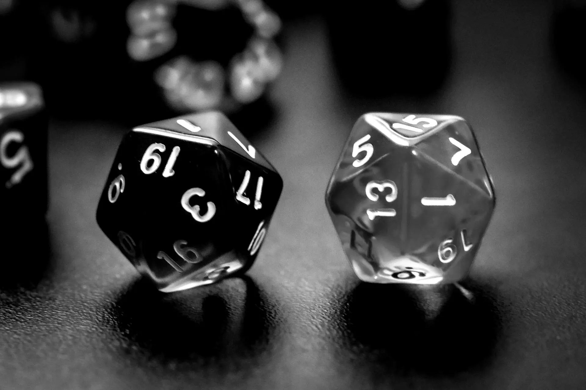 green and black dice on brown wooden table